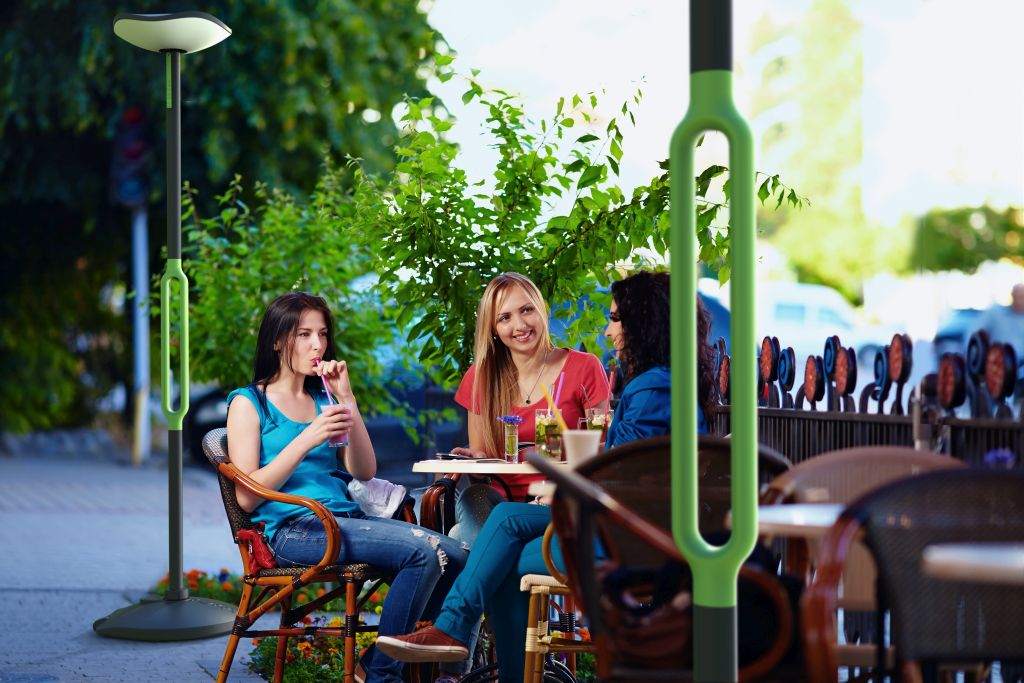 LUTEC Poppy solar LED floor lamp with Bluetooth speaker in outdoor garden setting