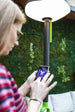 LUTEC Poppy solar LED floor lamp with Bluetooth speaker in outdoor garden setting