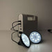Solar rechargeable emergency lantern with dual external LED lamps and power storage unit