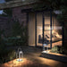 Handy Solar Rechargeable lantern illuminating outdoor patio area at night with modern design and soft warm light
