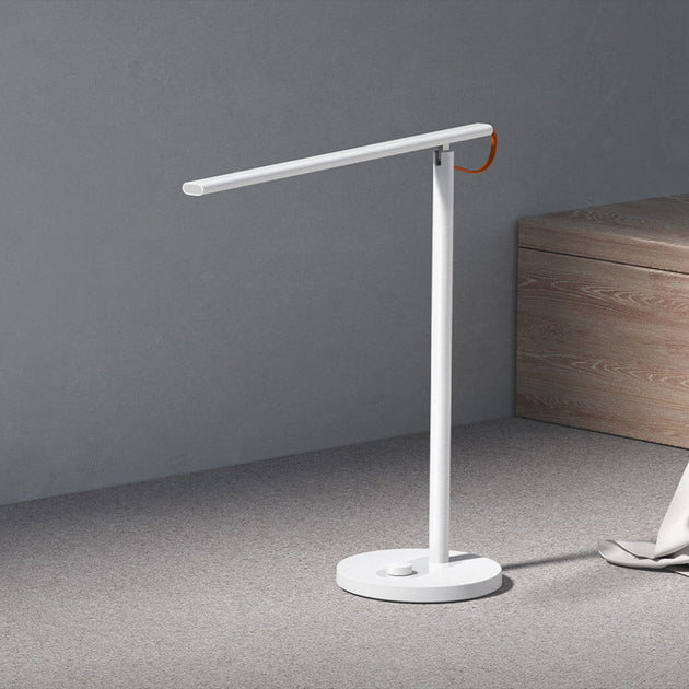 Mi LED Desk Lamp 1S white adjustable brightness desk lamp with modern design on gray background