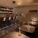 Pinup Mini cordless LED table lamps with slim aluminum design and touch dimming in cozy bar setting