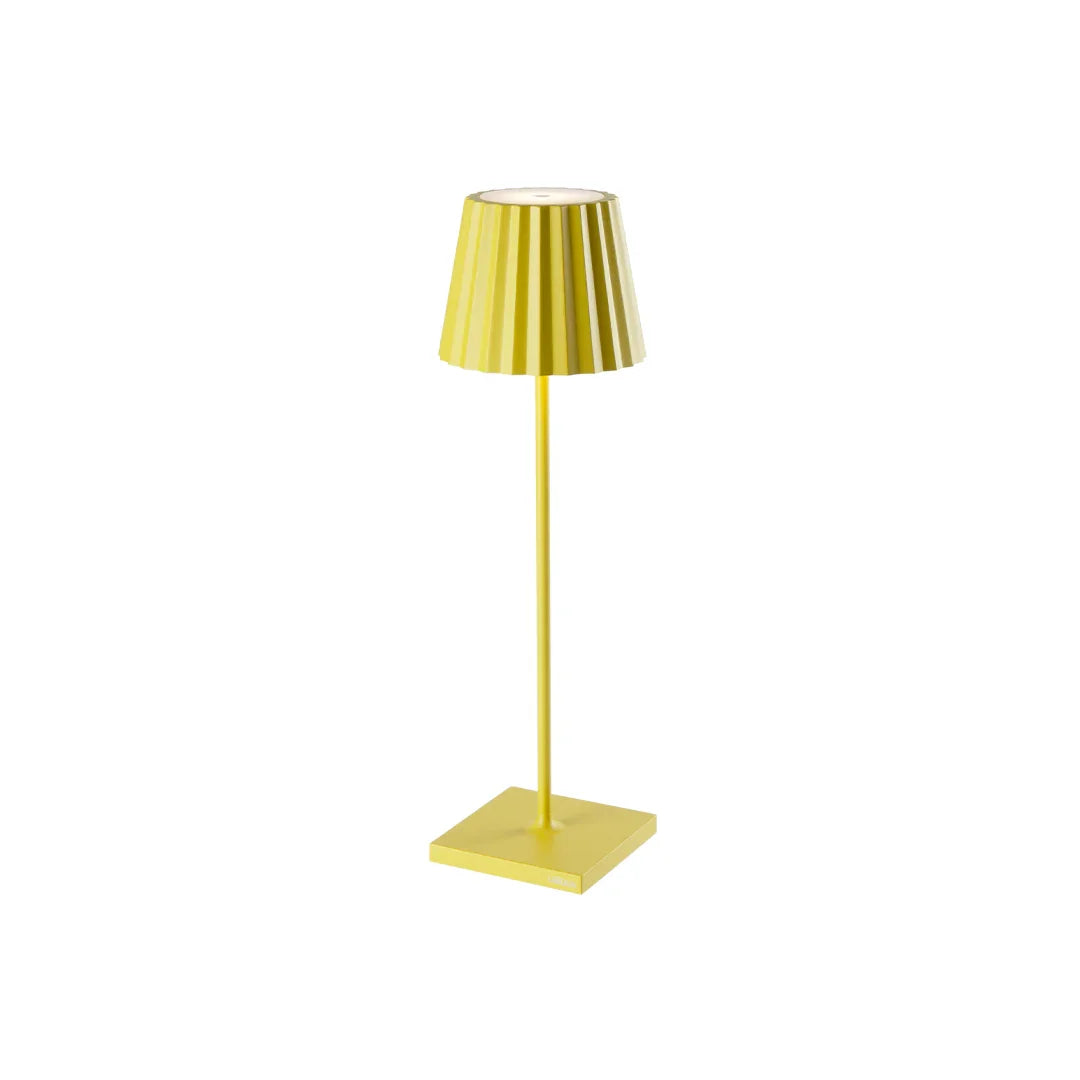 Plissé cordless yellow table lamp with pleated shade and modern design