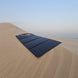 EcoFlow 160W portable folded solar panel on sand dune with waterproof and durable design