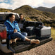 EcoFlow WAVE 2 portable air conditioner with add-on battery on truck bed in outdoor setting