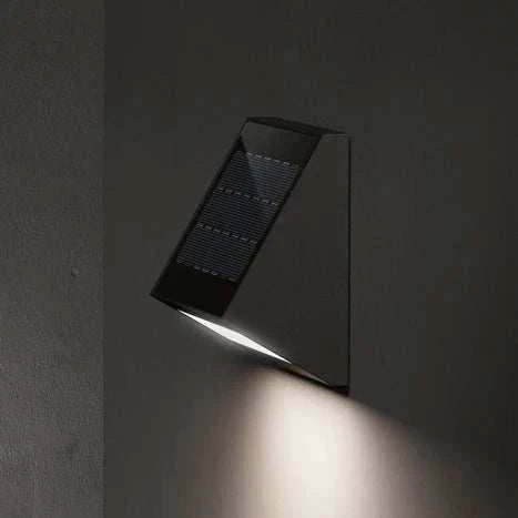 KLEWE ECOSTEP LED solar wall light in anthracite, mounted on wall, emitting light.