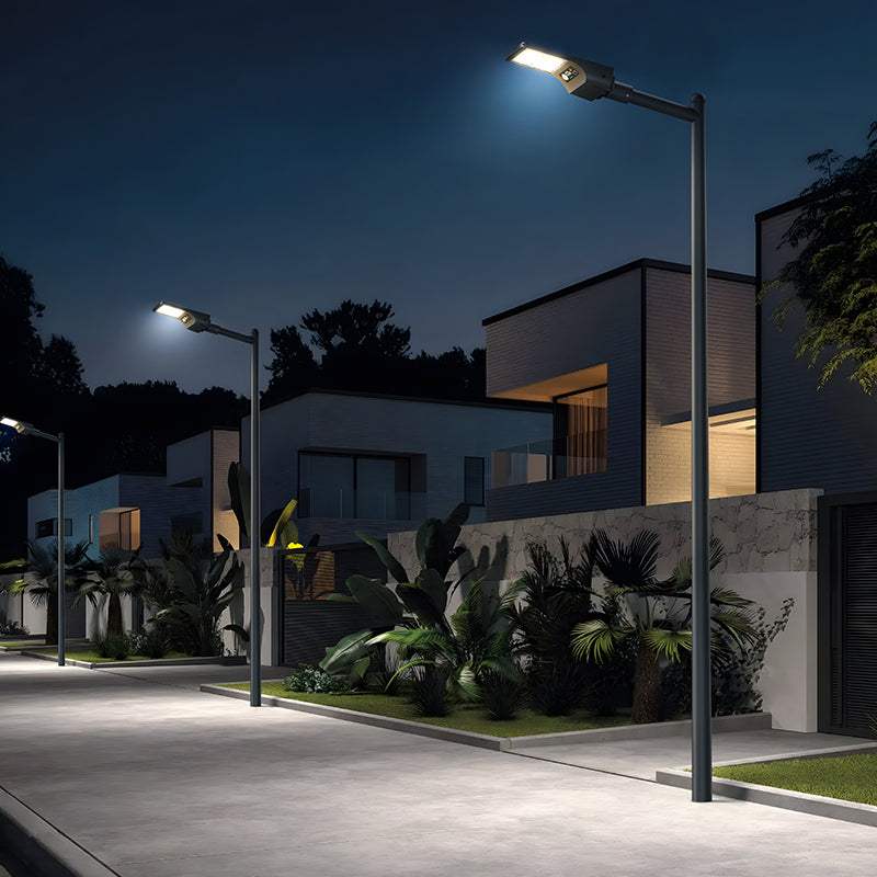 Integrated solar street lights illuminating a modern residential area at night