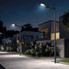 Integrated solar street lights illuminating a modern residential area at night