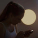 LED Ceiling Light with WiFi and Bluetooth connectivity in a dimly lit room, controlled via smartphone.