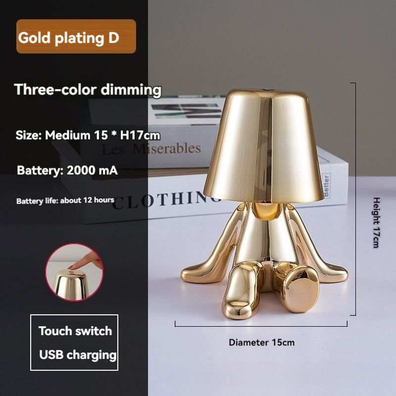 Little Golden Man Table Lamp with gold plating and three-color dimming.