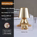 Little Golden Man Table Lamp with Oscar-like design and gold finish.