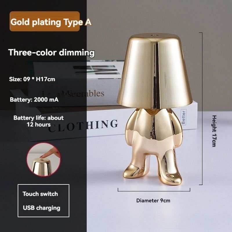 Little Golden Man Table Lamp with gold plating, USB charging, and touch switch.