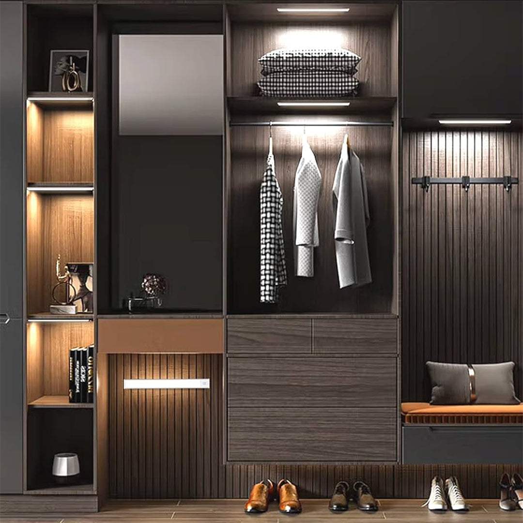 Ultra-slim motion sensor closet light with metal exterior illuminating wardrobe and shelves