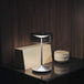 Crystal cordless table lamp with removable glass shade, offering modern elegance and functional design.