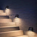 KLEWE ECOSTEP LED solar wall lights installed on outdoor steps, anthracite finish, IP65 rated.