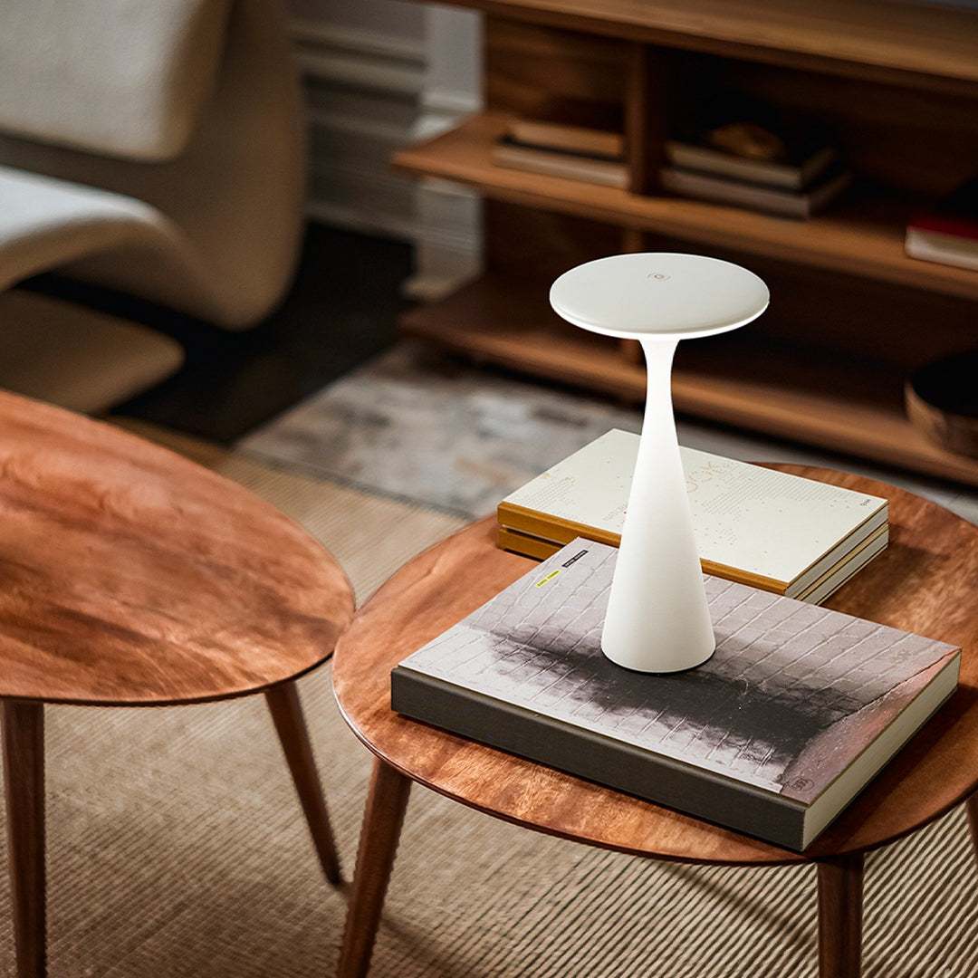Elant Dusk rechargeable white modern table lamp on wooden coffee table