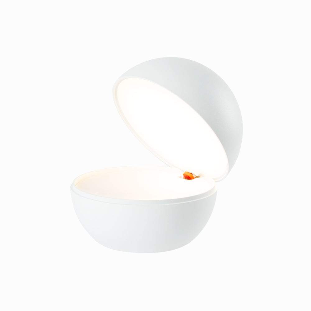 Goodnight cordless table lamp with a round, ball-like design, offering a cozy atmosphere; features include LED rechargeable function, flexible dimming, and opal polycarbonate diffuser.