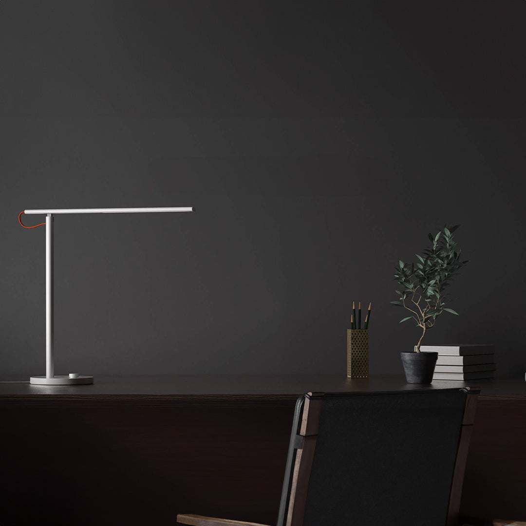 Mi LED Desk Lamp 1S on a desk with minimalist design and adjustable arm.