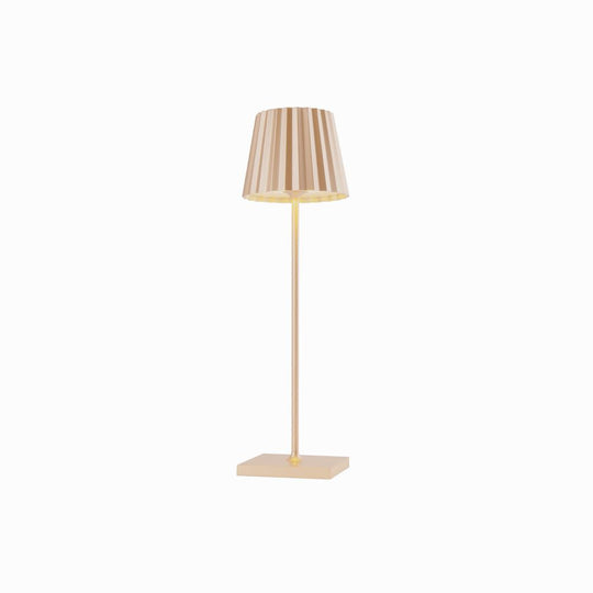 Plissé cordless table lamp with contemporary design, featuring a pleated shade, rechargeable LED, touch switch, flexible dimming, and aluminum die-cast body.