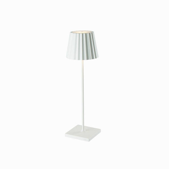 Plissé cordless table lamp, sleek modern design, white finish.