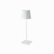 Plissé cordless table lamp, sleek modern design, white finish.