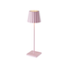 Plissé cordless table lamp with pleated shade and modern design.
