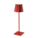 Red Plissé cordless table lamp with a contemporary design, featuring a fluted shade and a sleek stand.