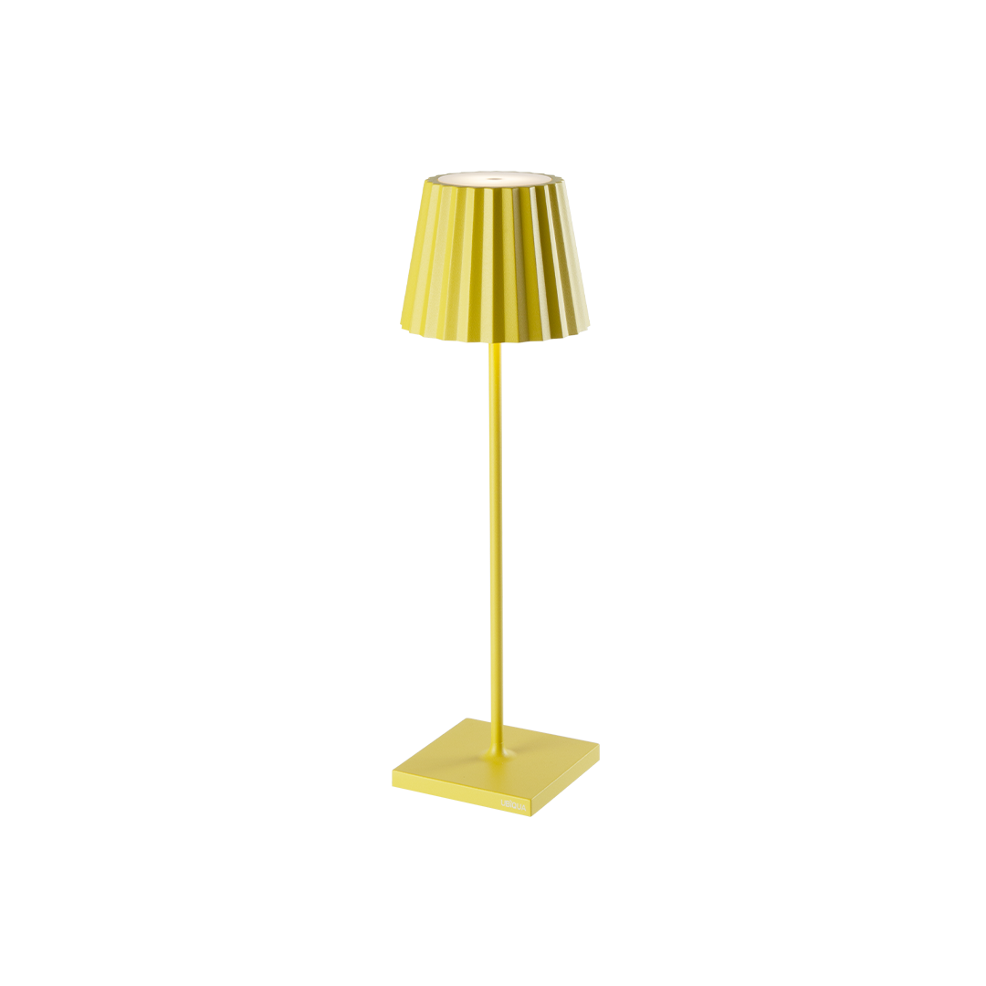 Cordless yellow Plissé table lamp with pleated shade design.