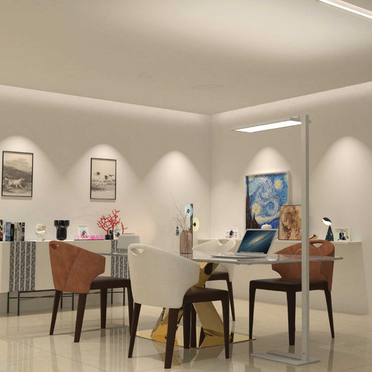 Modern indoor office setting illuminated by Sakura F004 floor lamp with full-spectrum, anti-glare light and sleek aluminum alloy design