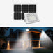 Solar Flood Light with 5V panel illuminating a modern house exterior at night.