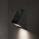 KLEWE ECOSTEP LED solar wall light in anthracite, mounted on wall, emitting light.