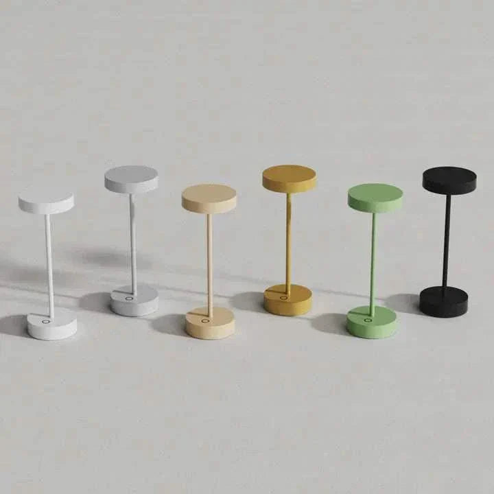 Minimalist portable LED lamp, Standy Maxi, available in six colors; sleek design, flexible dimming, water and dust-resistant, ideal for indoor and outdoor use.