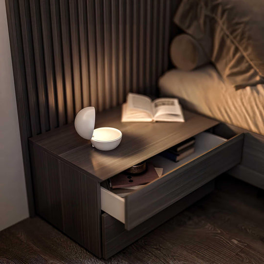 Goodnight cordless LED rechargeable table lamp with round ball design on bedside table emitting warm light