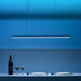 Yeelight Crystal Pendant Light over dining table with blue ambient lighting.