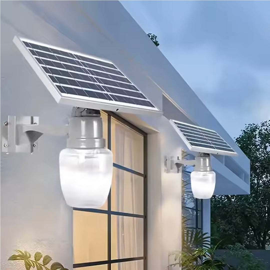 Elant Solar Golden Apple Light mounted on wall with solar panel illuminating outdoor space at dusk
