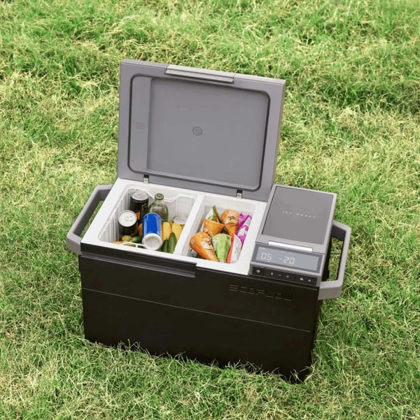 EcoFlow GLACIER portable refrigerator with dual zones and integrated ice maker on grass