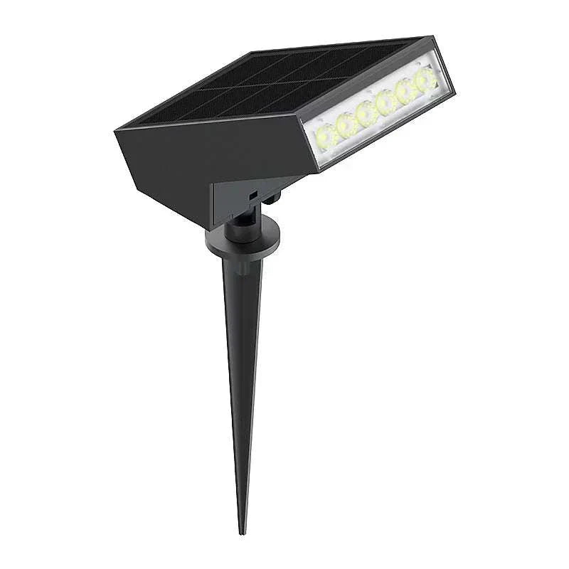 Black solar path light with 500 lumens LED and 3000K soft white illumination on a stake mount