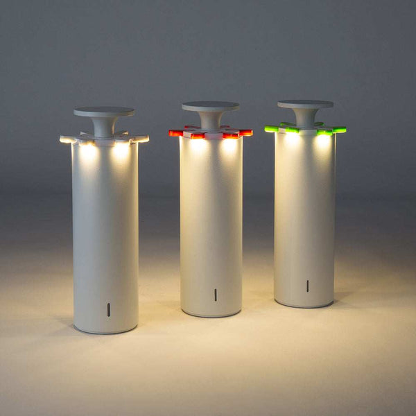 LED rechargeable table lamp with touch switch and IP54 waterproof rating in white cylinder design with colored top accents